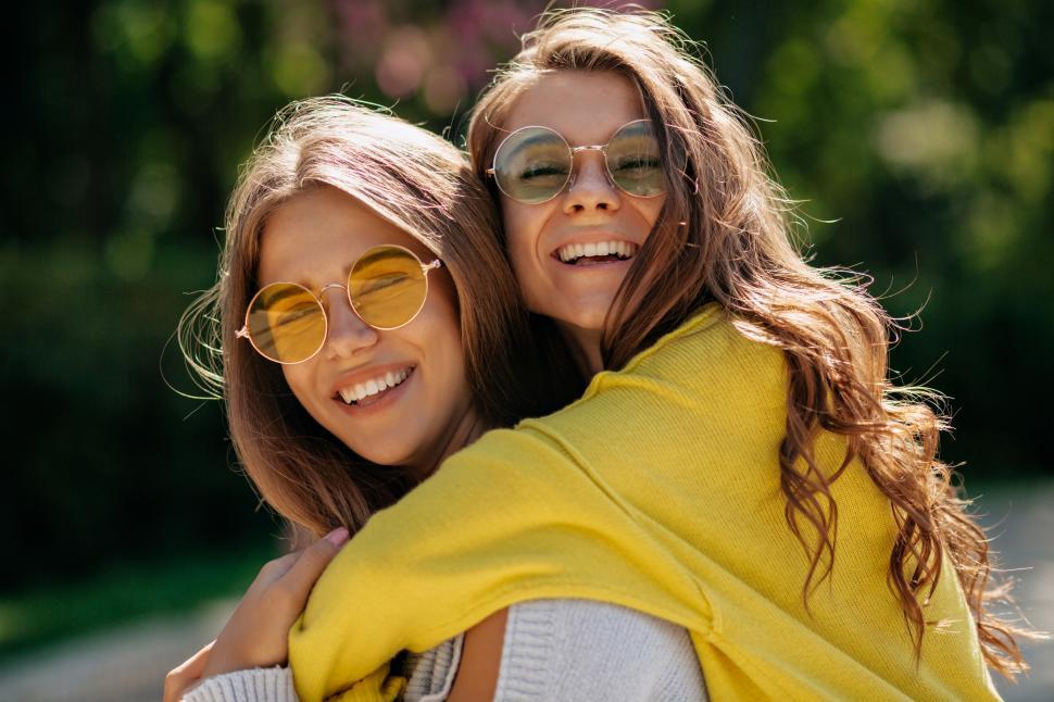 Free Image of Close-up outside portrait of friendly best friends 