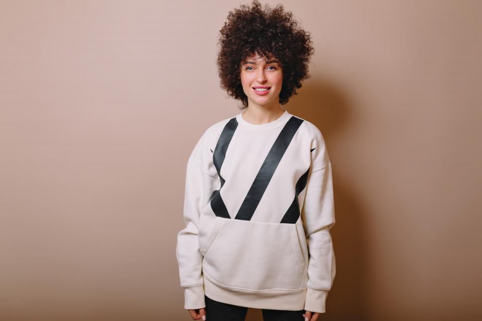 Free Image of Stylish adorable woman with short curly hair 
