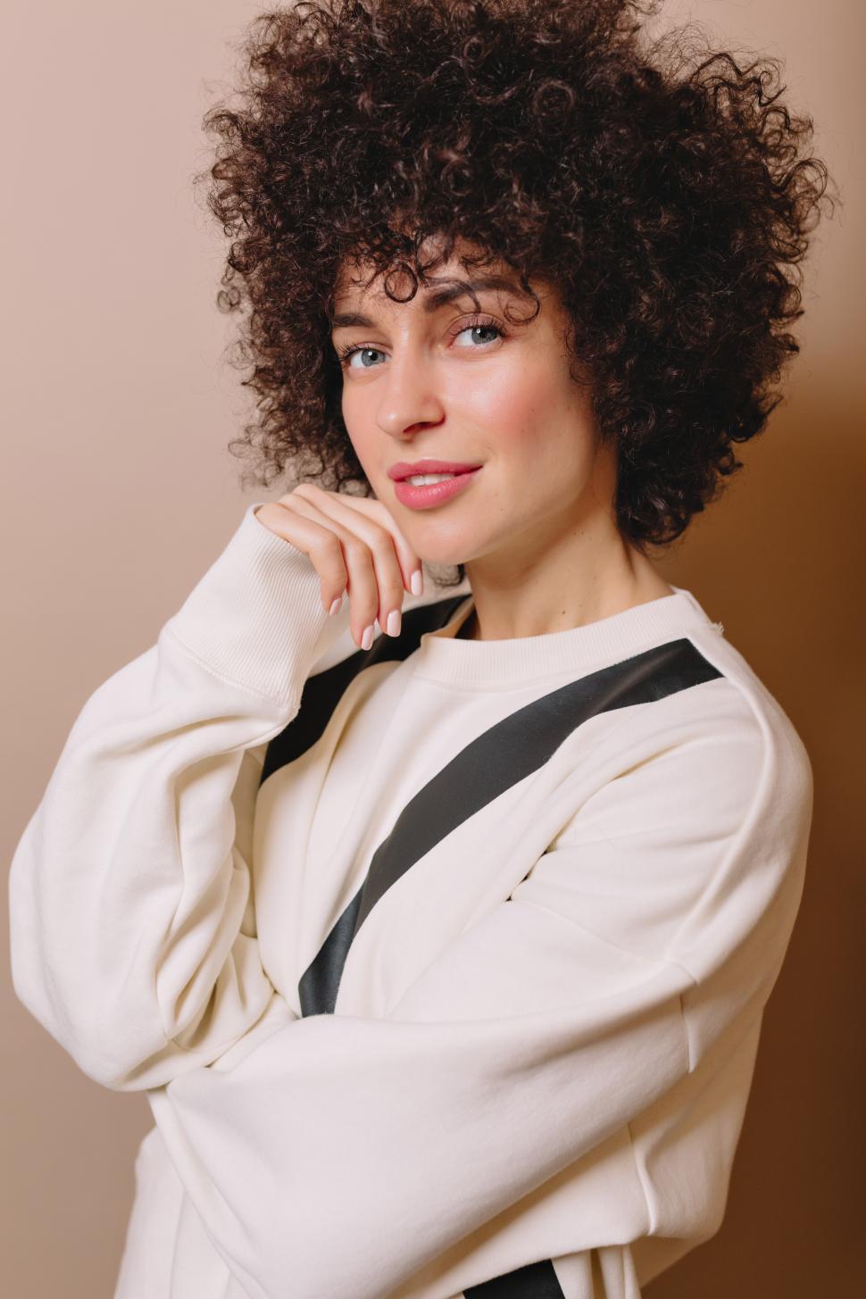 Free Image of Lovely young woman looking at camera 