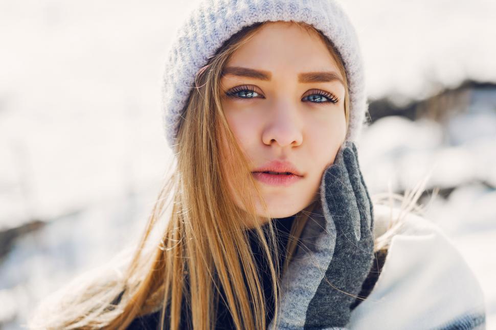 Free Image of Winter lifestyle portrait of young blonde lady 