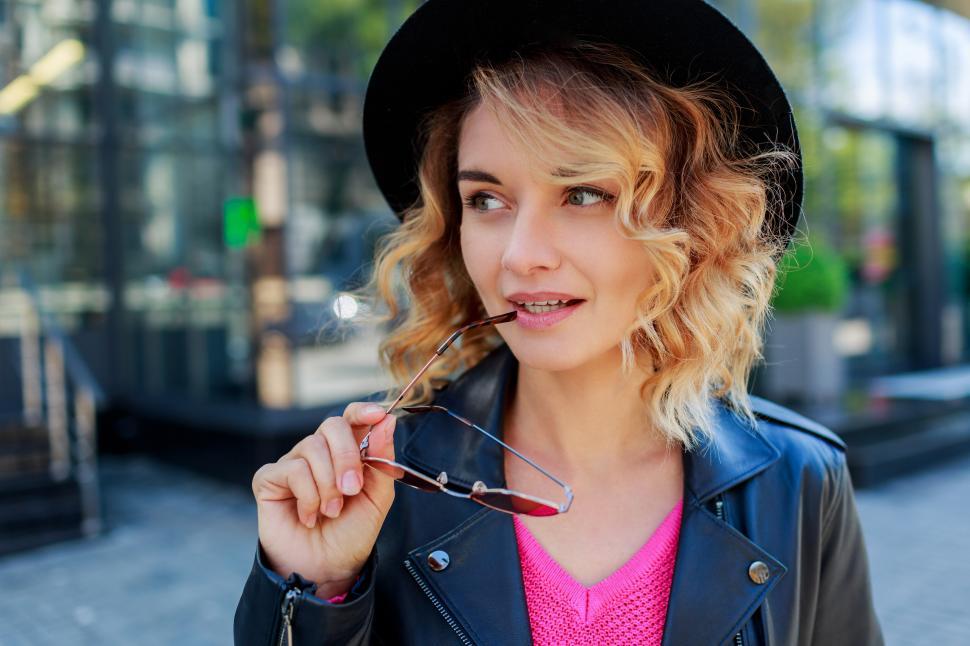 Free Image of Woman walking on streets of big modern city 