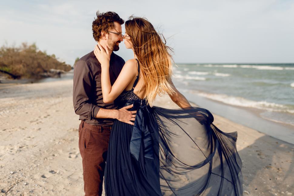 Free Image of Fashionable woman and man outdoor near the sea. 