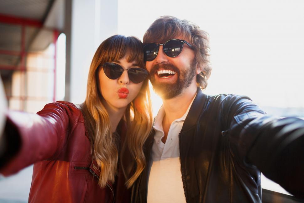 Free Image of Beautiful stylish couple of love taking self portrait 