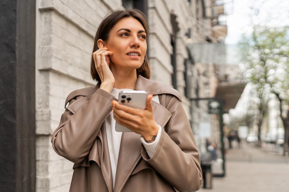 Free Image of Street  lifestyle  photo of stylish european business woman 