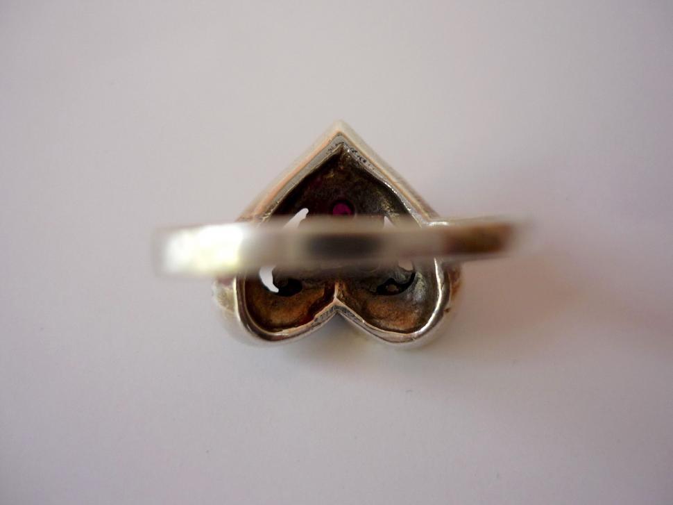 Free Image of Close Up of a Ring on White Surface 