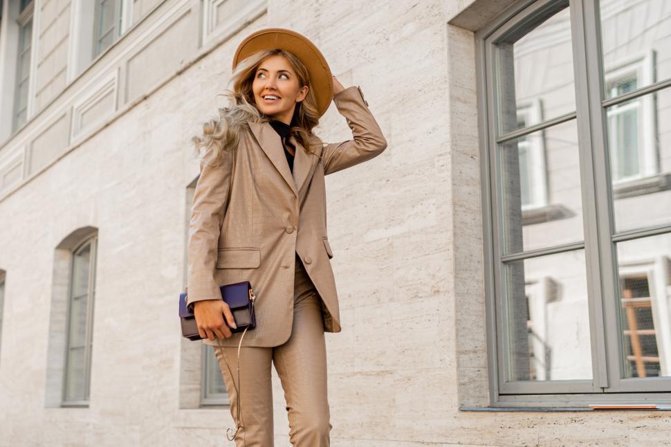 Free Image of Model posing in trendy leather jacket and pants outdoor 