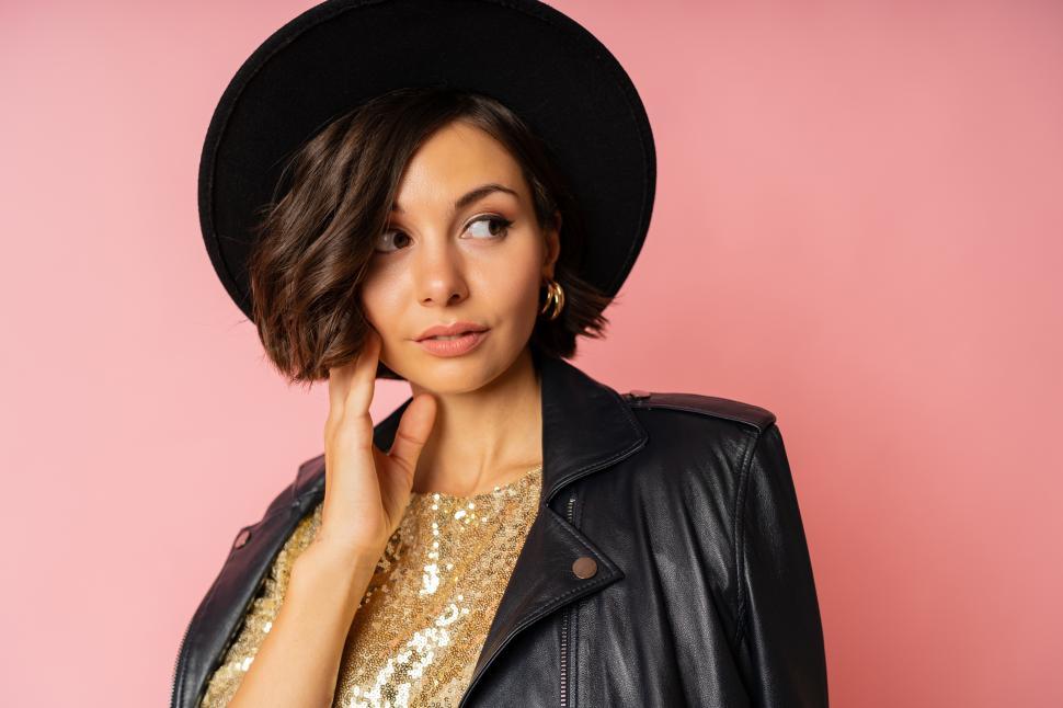 Free Image of Woman in black hat and jacket 