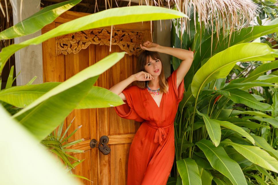 Free Image of Woman enjoying vacation in luxury resort 