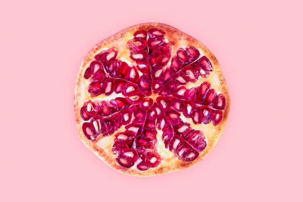 Free Image of clean and modern pomegranate fruit still life 