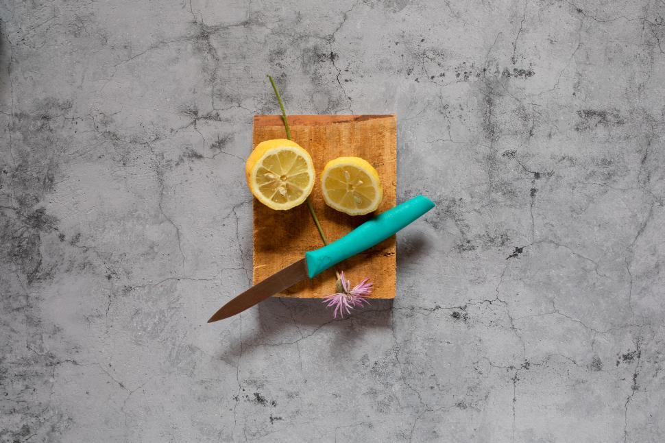 Free Image of lemon and sliced fruit still life 