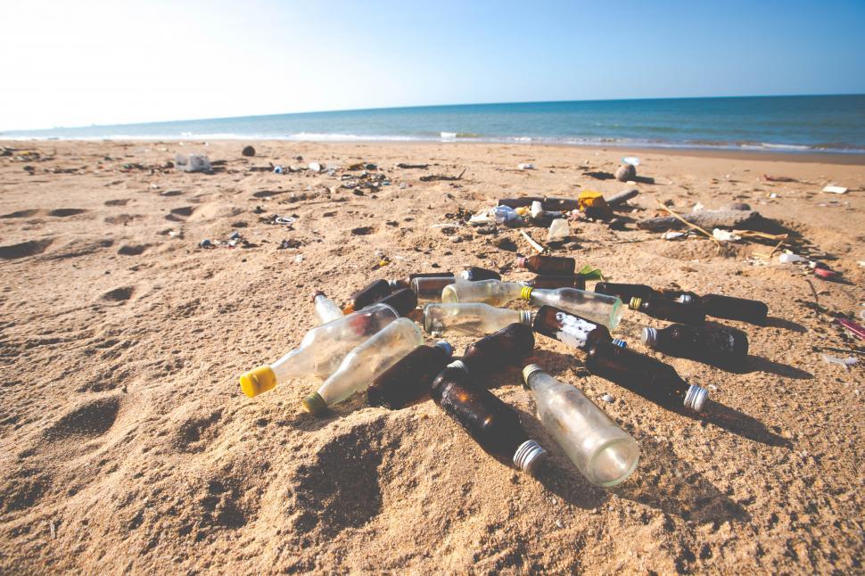 Free Image of bottles and garbage waste on the beach 
