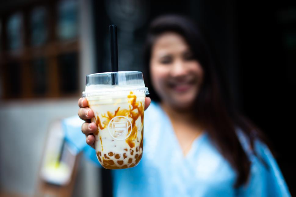 Free Image of Cute woman in coffee cafe, Happy Asian woman in a cafe 
