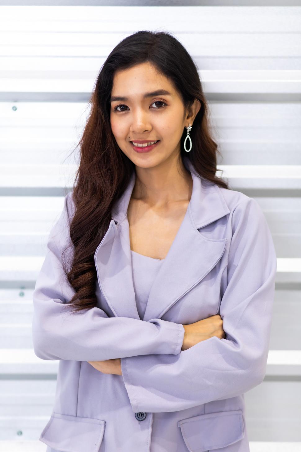 Free Image of Portrait of young white woman in modern workplace 