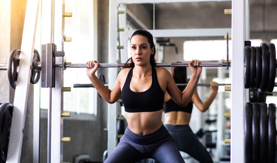 Free Image of Woman doing squats 
