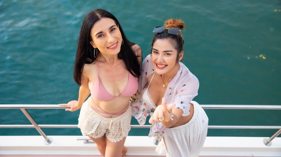Free Image of Lesbian couple in love on a boat 