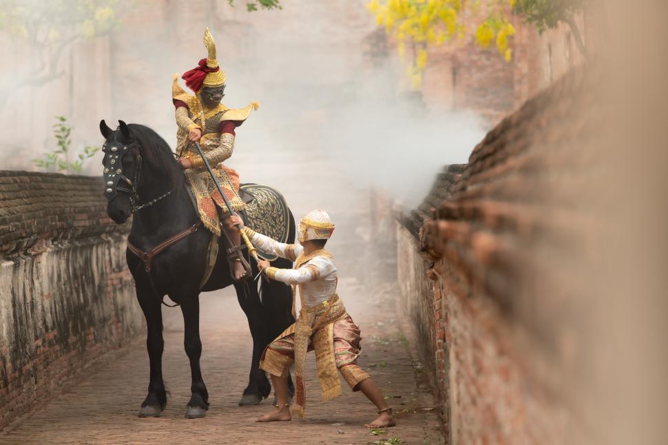 Free Image of Battle between the giant and Hanuman in Khon, classical Thai dance in a mask. 