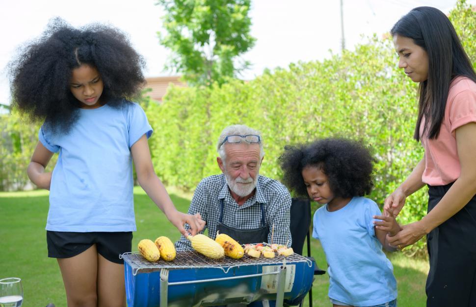 Free Image of Family holiday activities with grandfather, mother and children 