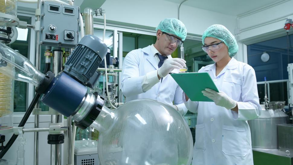 Free Image of Scientists extracting cannabis oil with machines 
