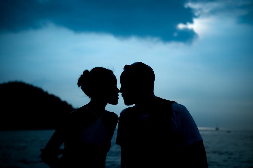 Free Image of Couple on a yacht enjoy peaceful moment 