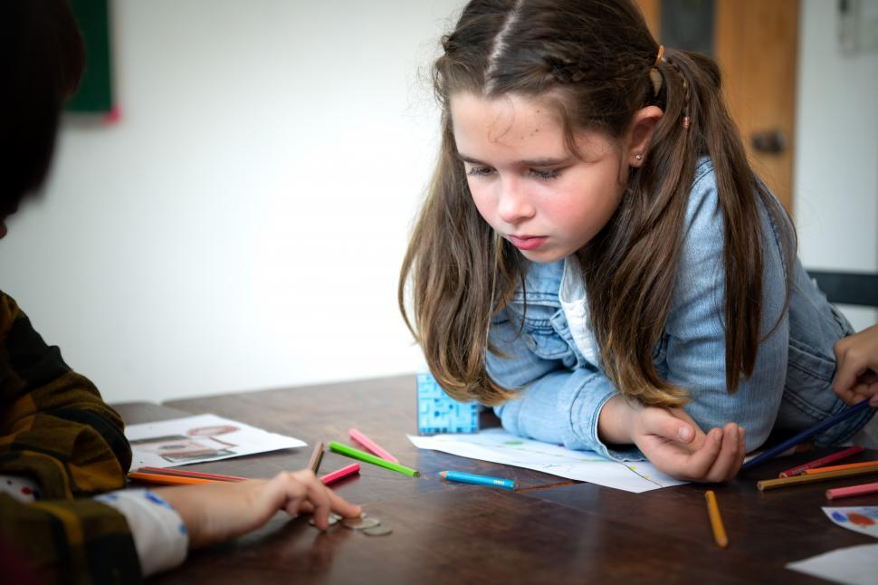 Free Image of A student learning about money 
