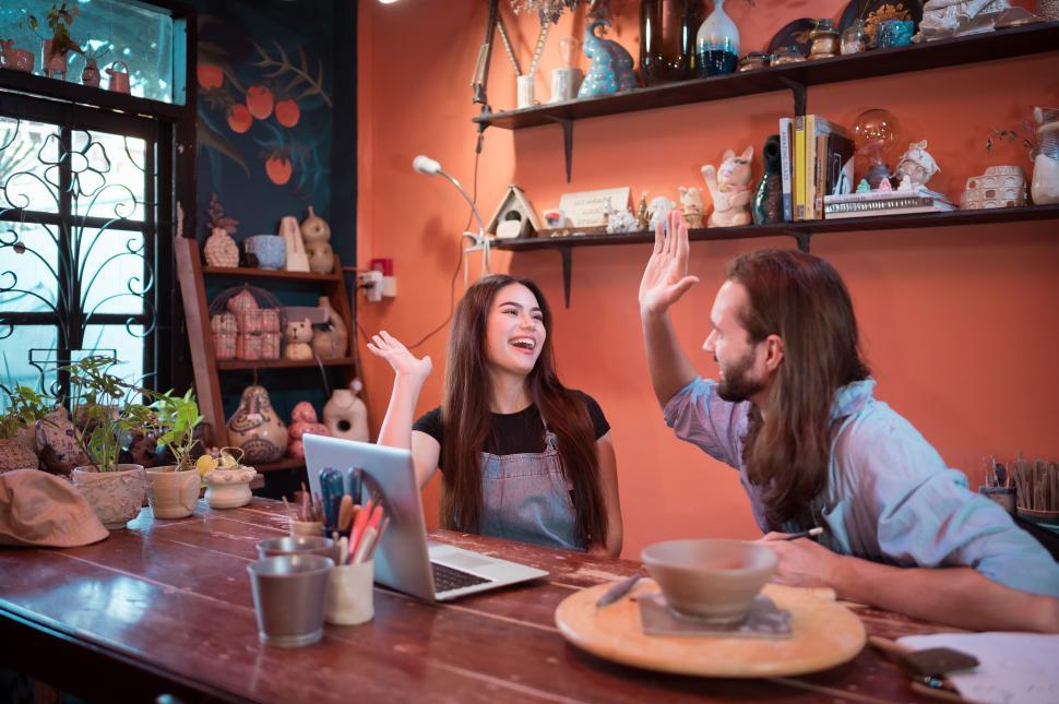Free Image of Two young entrepreneurs who own a pottery business 