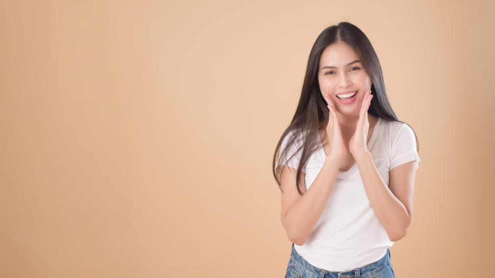 Free Image of Young woman projecting her voice towards the viewer. 