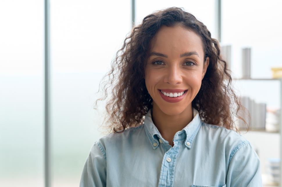 Free Image of Portrait of young Black businesswoman smiling in modern office 