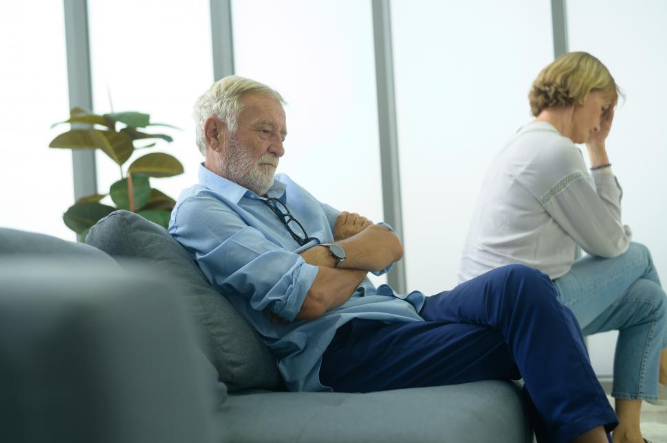 Free Image of Mature adult man and woman are both looking upset and stressed 