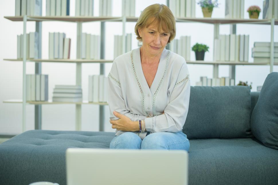 Free Image of Senior citizen - woman has a stomachache 
