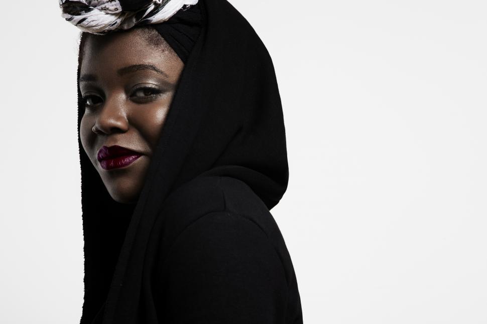 Free Image of beautiful african woman with a covered head and bright makeup 