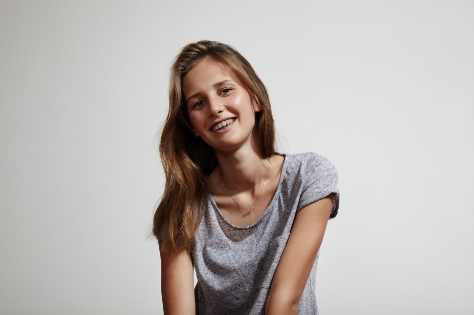 Free Image of Smiling young girl with semi invisible clear braces 
