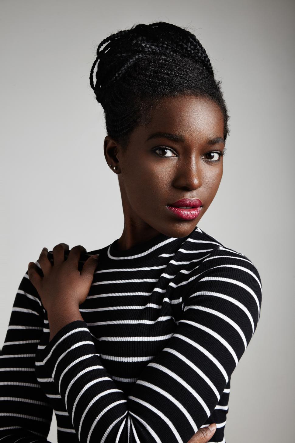 Free Image of pretty black woman looking at camera 