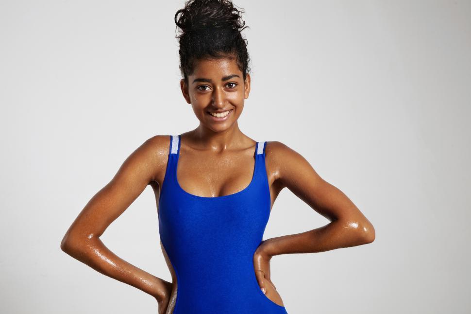 Free Image of woman in studio with wet skin after swim, workout or shower 