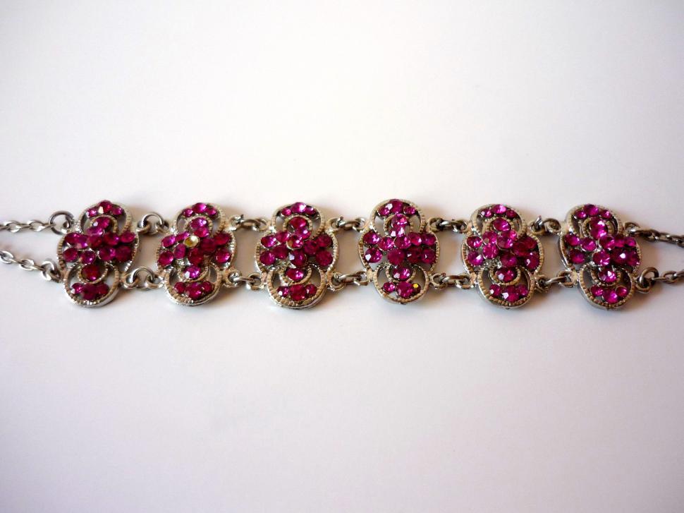 Free Image of Silver Bracelet With Pink Stones 