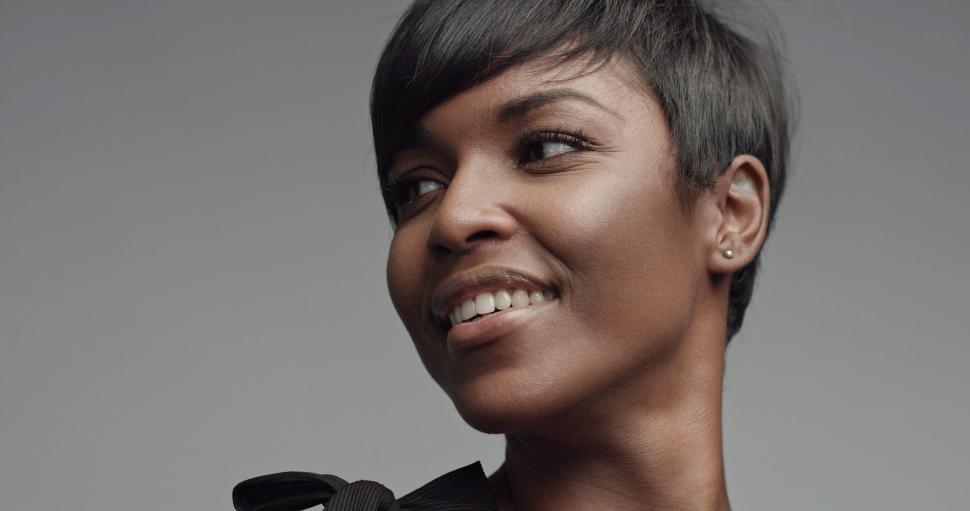 Free Image of portrait of a black woman in closeup, looking to the side 