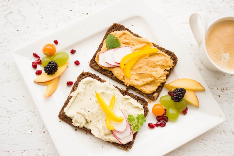 Free Image of A plate of food with fruit and a spoon 