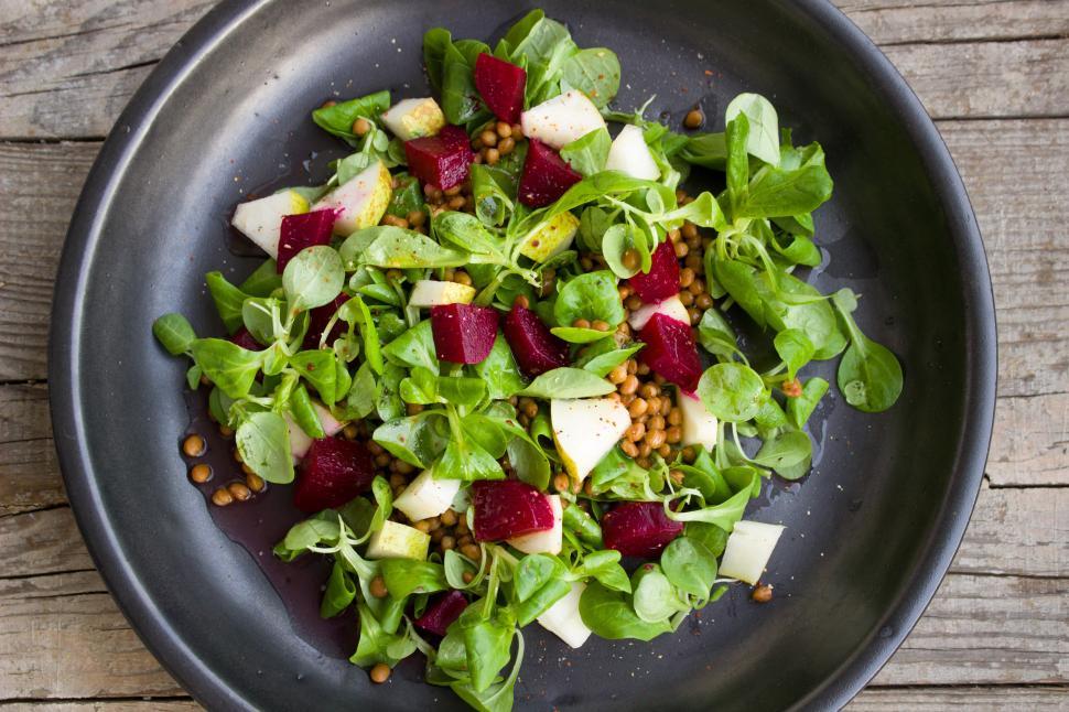Free Image of A plate of salad with vegetables and greens 