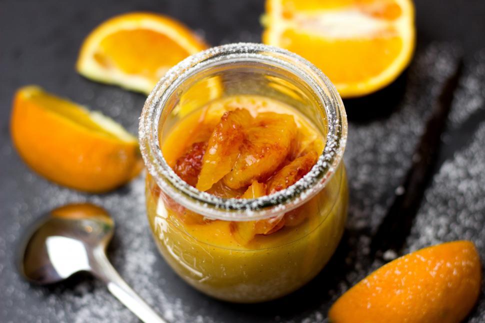 Free Image of A jar of orange custard 