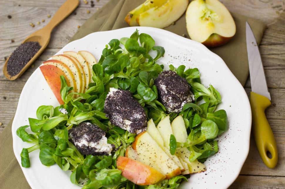 Free Image of A plate of salad with apples and cheese 