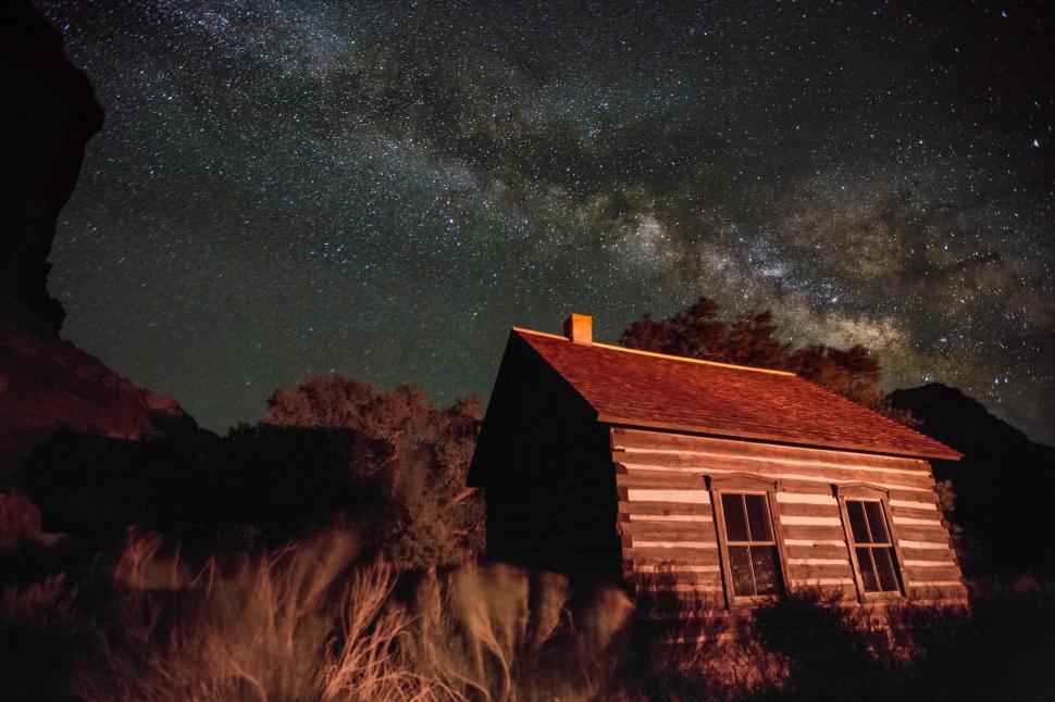 Free Image of A house in the woods at night 