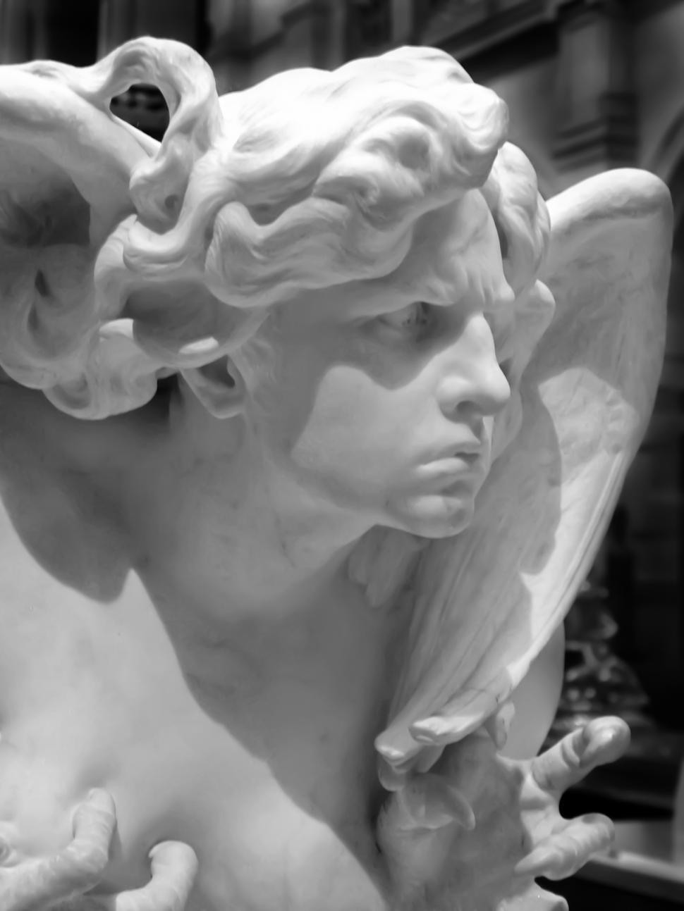 Free Image of A statue of a man with wings 