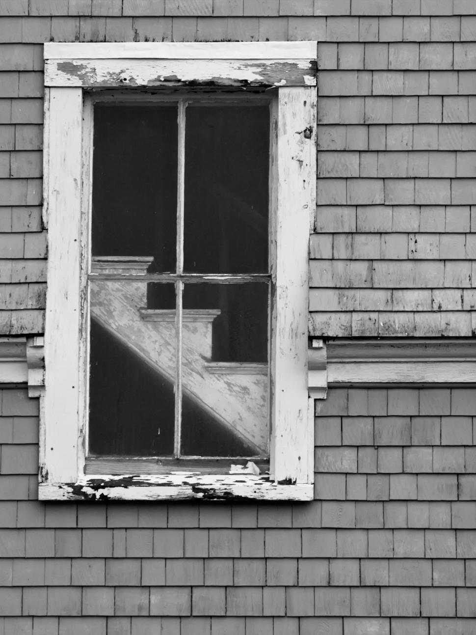 Free Image of A window with a staircase in it 