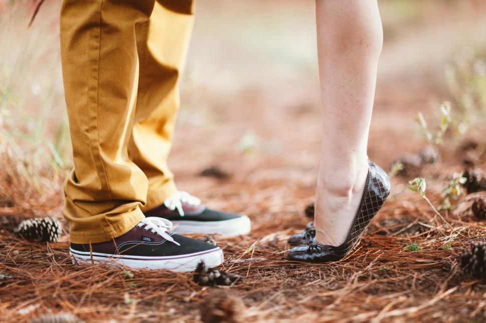 Free Image of A pair of legs and feet in shoes 