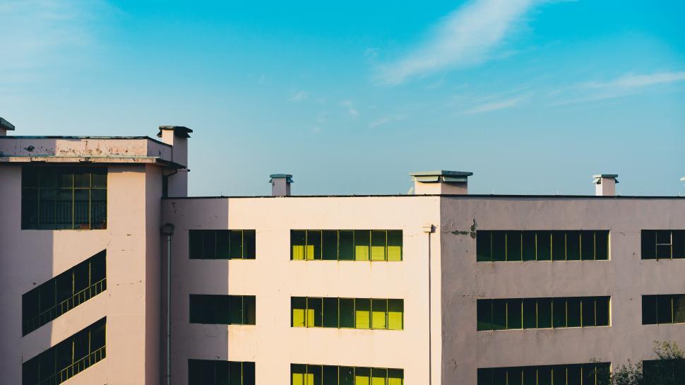 Free Image of A building with many windows 