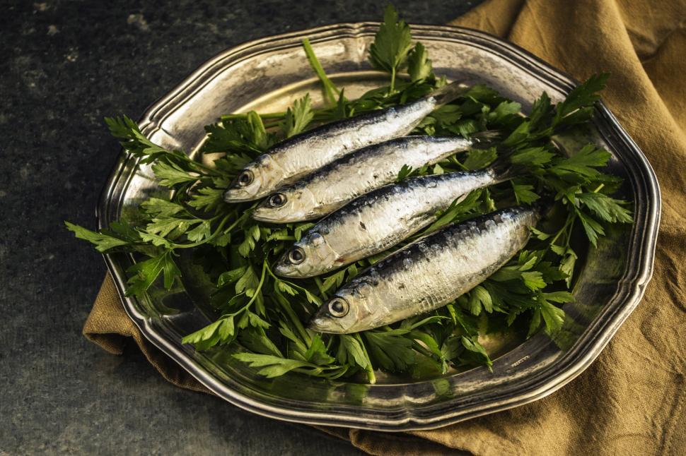 Free Image of A plate of fish on a table 