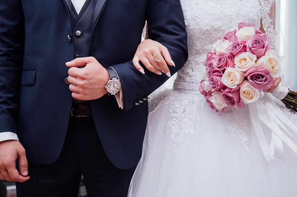 Free Image of A man and woman in a suit 