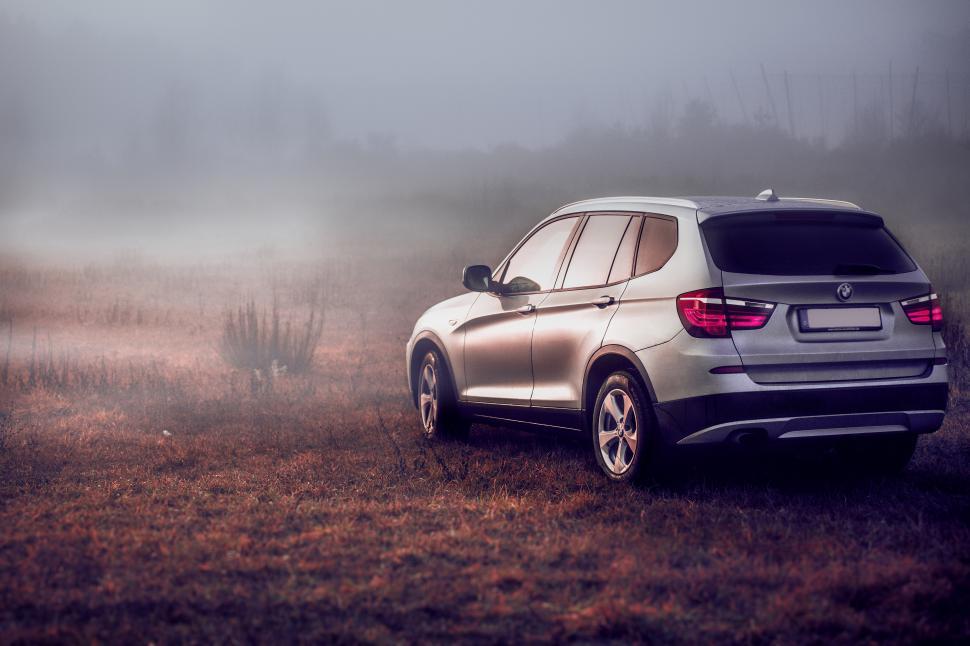 Free Image of A car parked on a field 