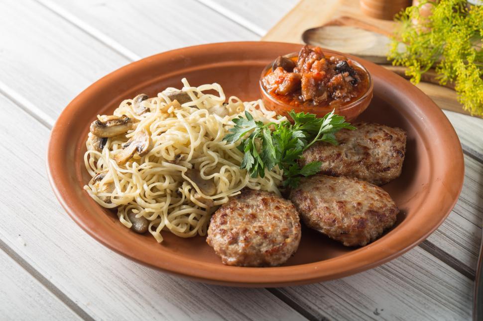 Free Image of A plate of food on a table 