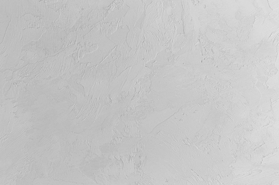Free Image of A white surface with rough texture 
