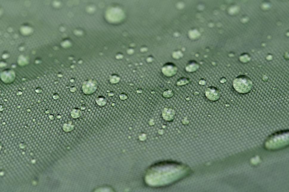 Free Image of Water droplets on a fabric surface 